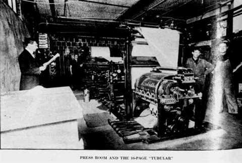 Historic Press Room and four individuals.jpg