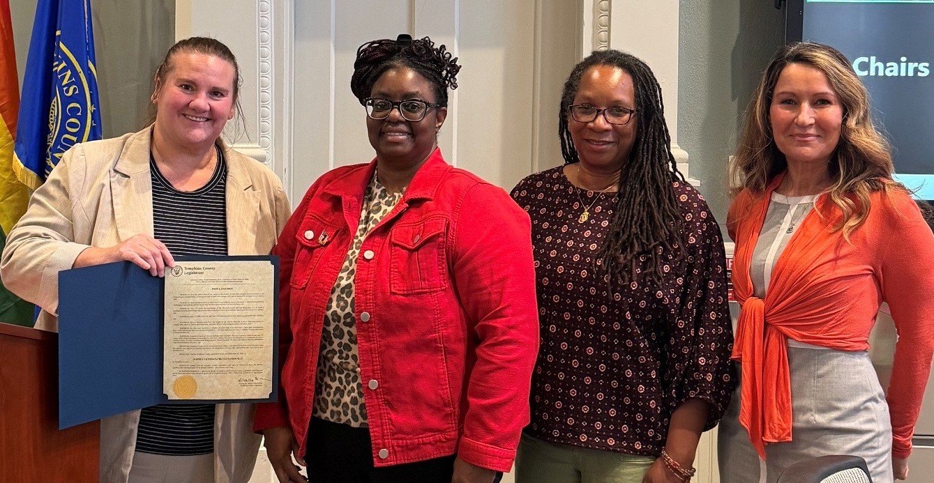 Four females with Women Veterans Month proclamation