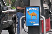 Your kids learn about cigarette brands while you pump gas! How convenient!